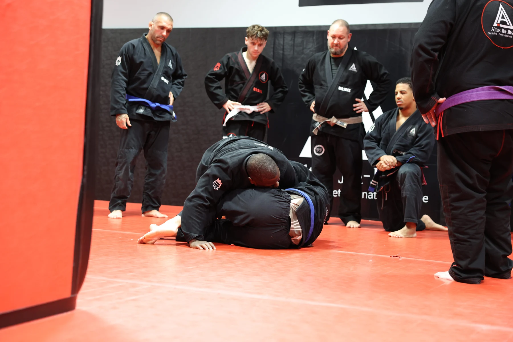 Altus students gathered around a technique demonstration