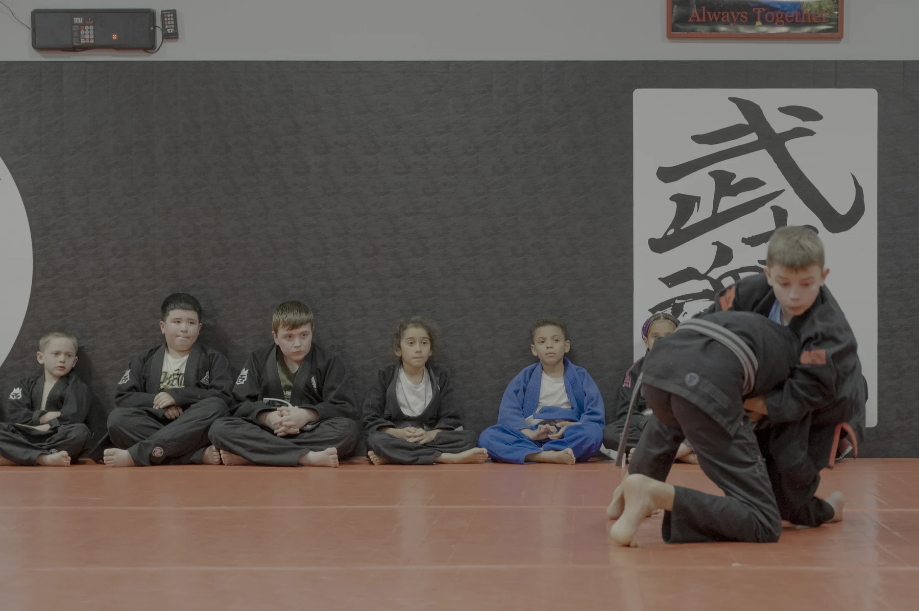 Young students practicing a technique during an Altus class
